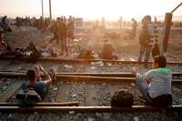 Idomeni na severu Řecka, urpchlíci čekající na řecko-makedonské hranici (Matthieu Alexandre/CI)
